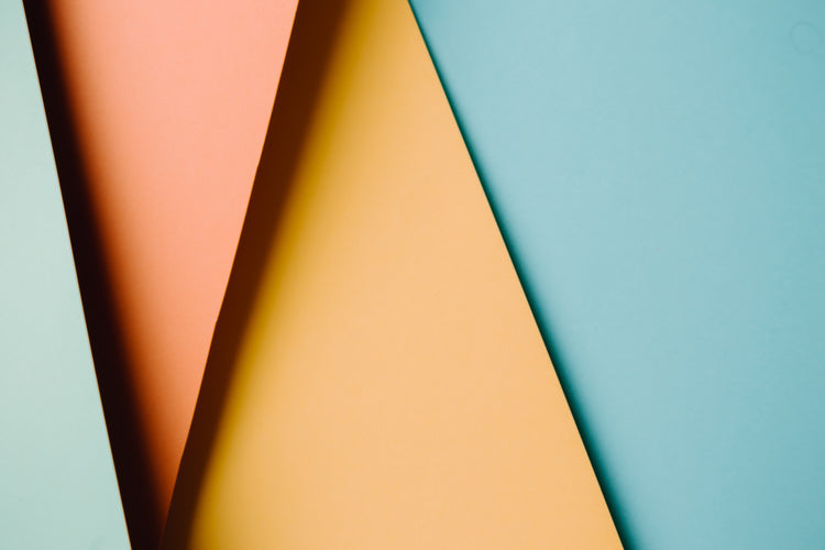 an abstract image of four colored triangles