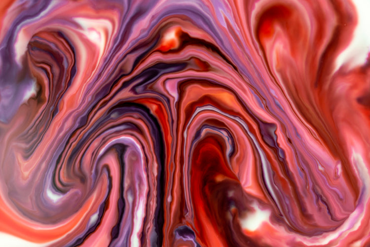 an abstract marbled image in pink and purple.